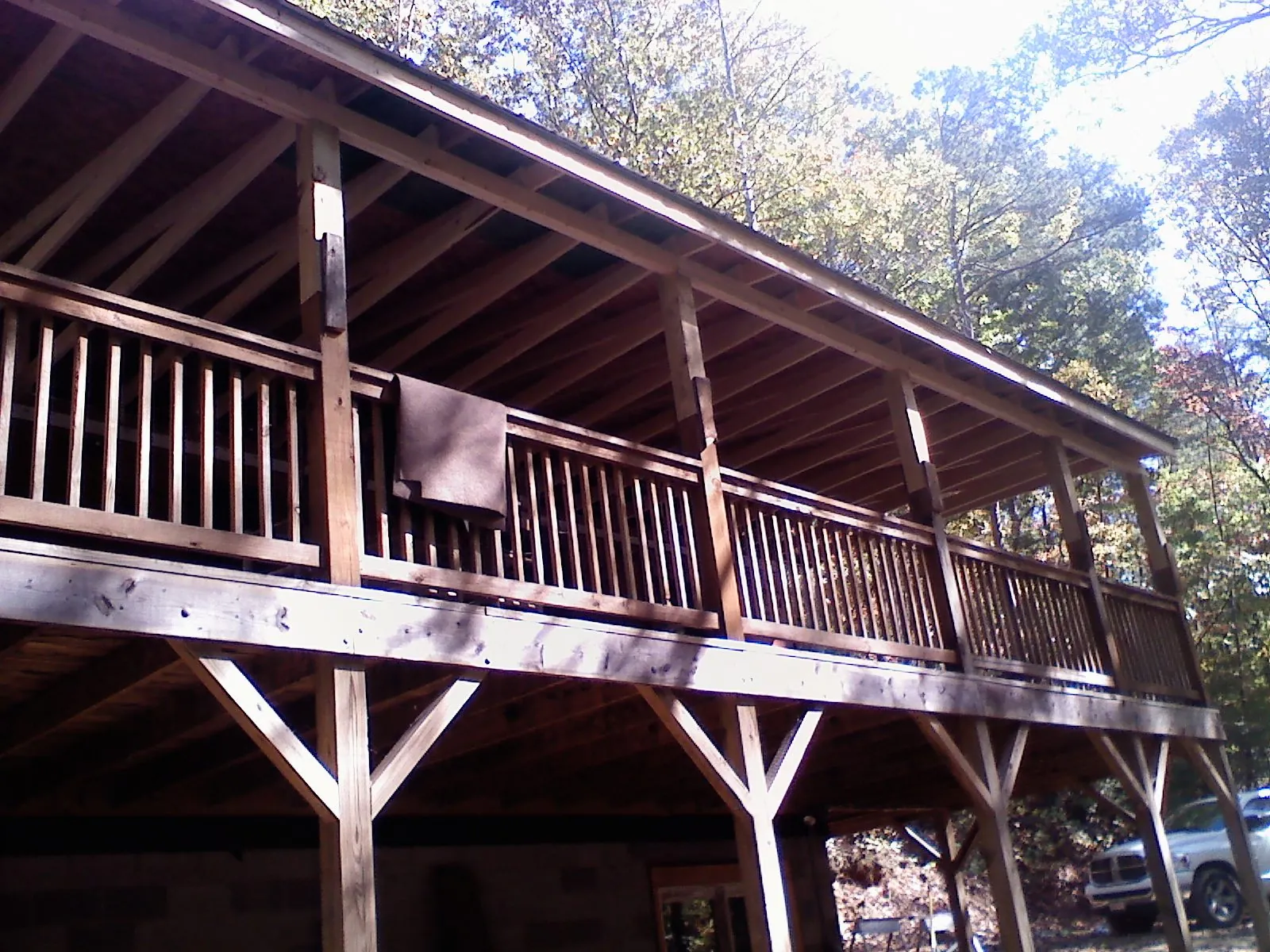 Timber framing under a new elevated porch and deck — Roof Leak Repair in Georges Mills by Roofing Brothers